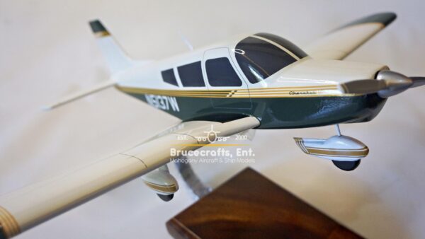 Model of Piper PA-28 Cherokee with detailed craftsmanship.